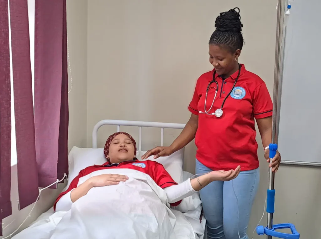Learner practising patient care at Kunokhanya Training Academy